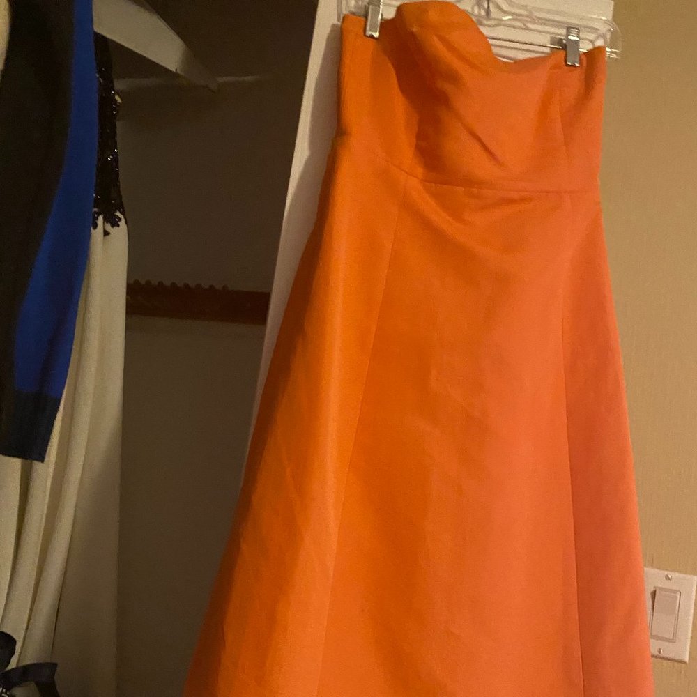 orange strapless mid length dress